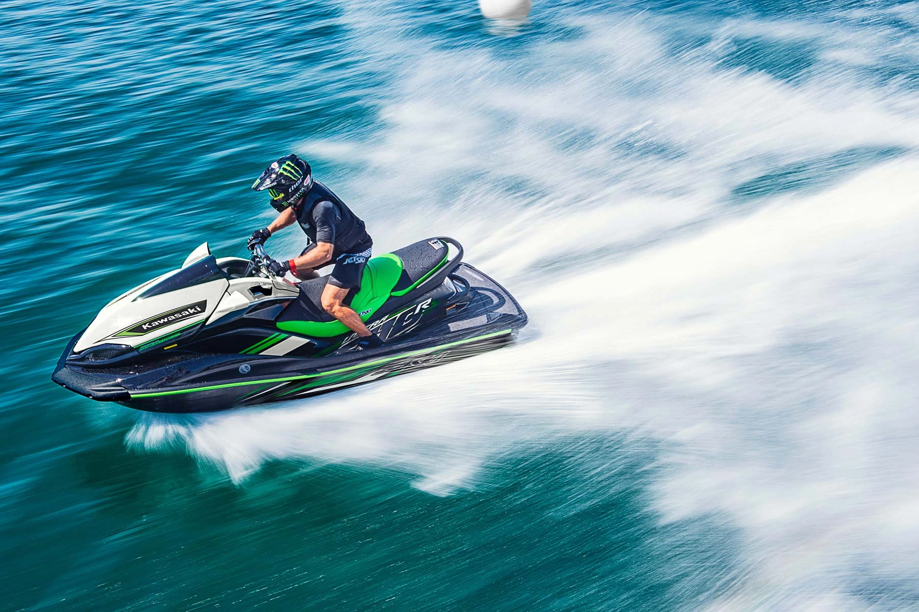 Person riding a jet ski at high speed on the Mediterranean Sea near Khalde, Lebanon.