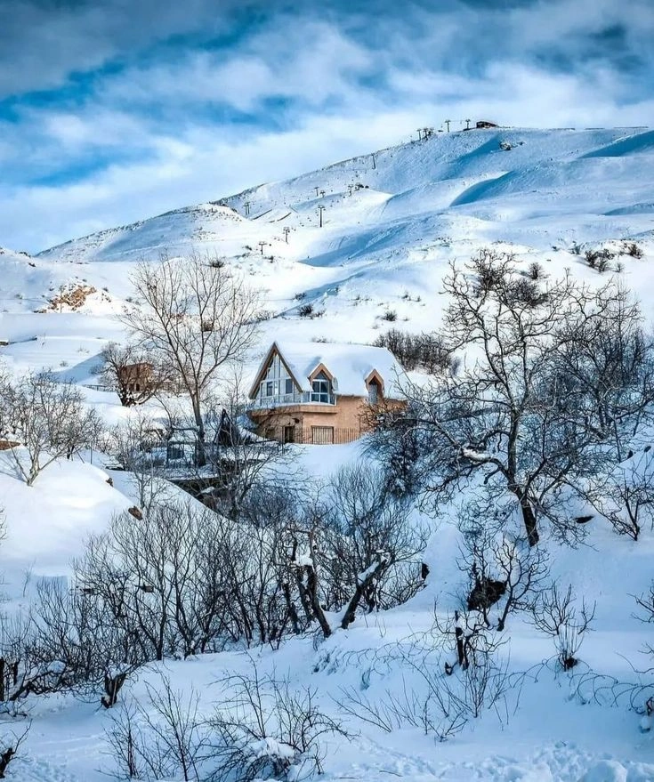 Snow-covered chalets and ski slopes at Zaarour resort in the mountains of Metn, Lebanon